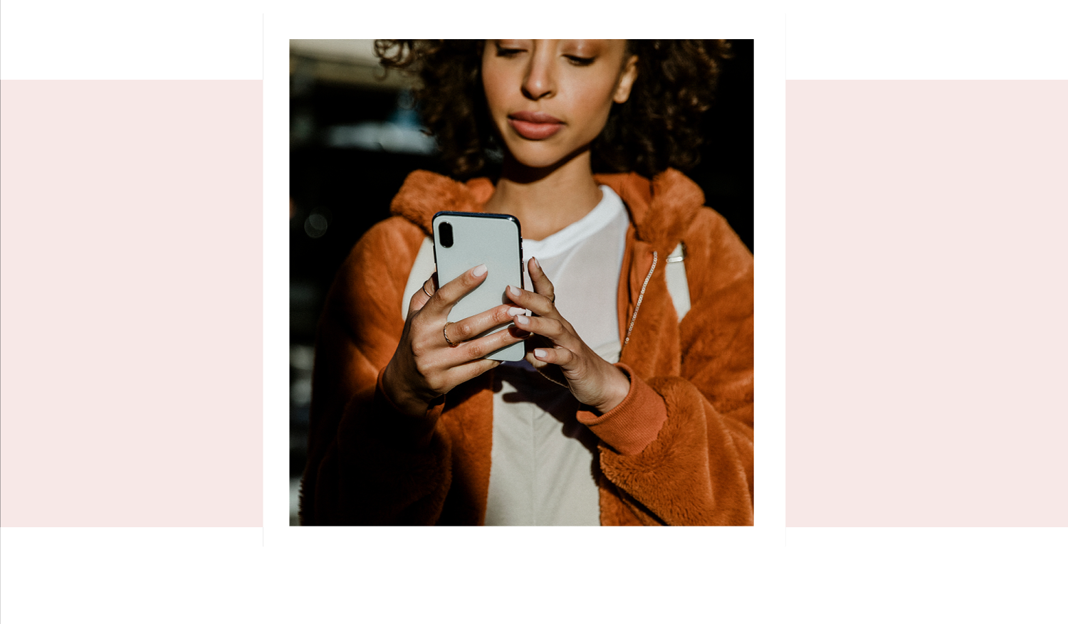 A woman searching on her phone for pregnancy support in Freeport, Florida